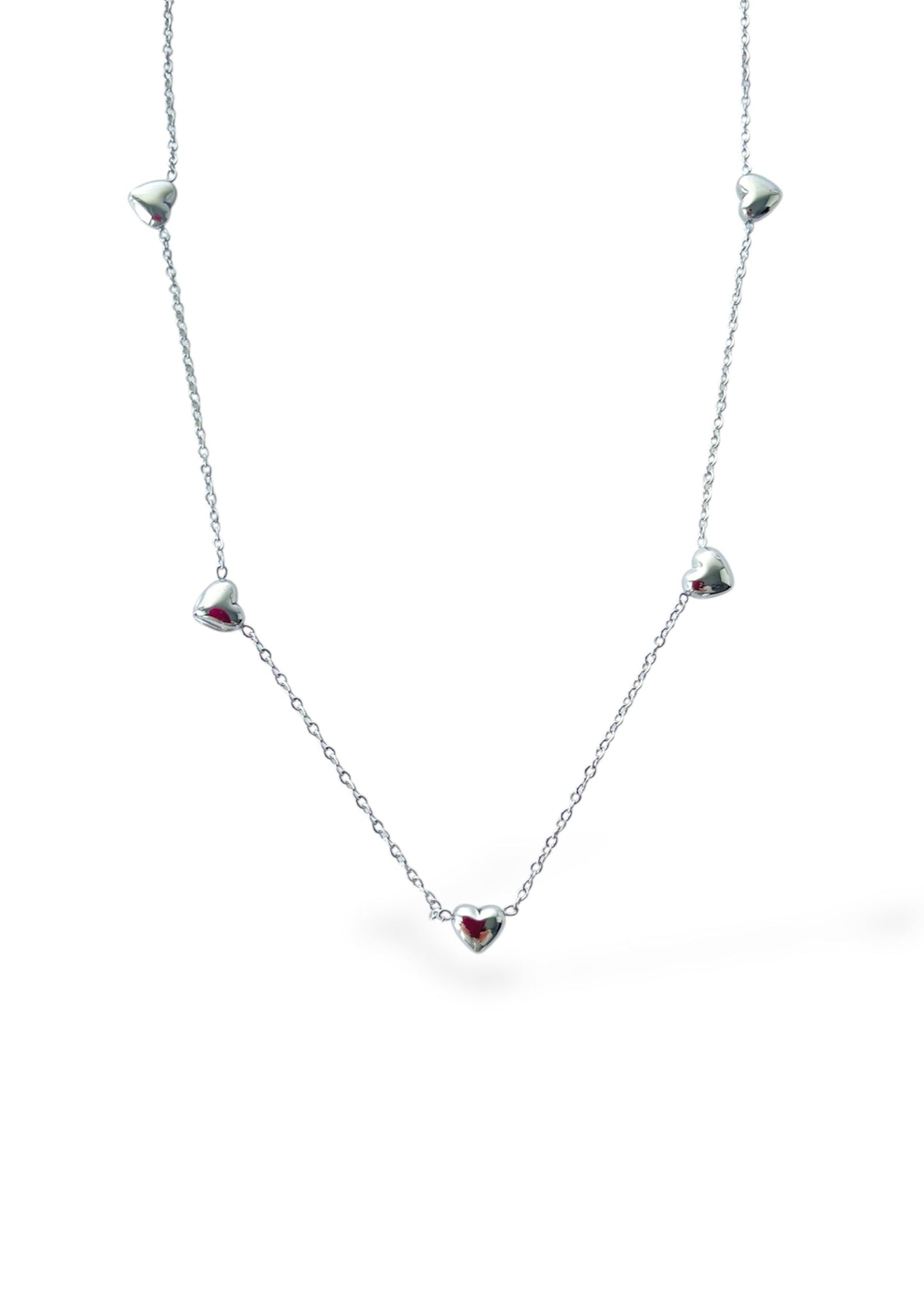 Mini corações prateados